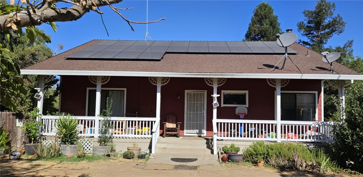 This charming 3-bedroom, 2-bath ranch-style home on 3.66 acres is nestled in the middle of a peaceful walnut orchard that is truely a gardener’s paradise. The lush yard features 10 varieties of fruit trees, olive trees, grapevines, roses, Mountain Views, all supported by a convenient drip irrigation system. Additional highlights include a spacious fenced yard, a chicken coop, solar panels, and a new central A/C & heating unit.
Inside, the open floor plan showcases cohesive wood finishes, creating a warm and inviting atmosphere. The living room features an energy-efficient wood-burning stove, a built-in entertainment area, and a hutch. The guest bedrooms boast walk-in closets with elegant pocket doors and stunning tile flooring. The spacious primary suite includes bamboo flooring, a large built-in wardrobe, a walk-in closet, and a beautifully remodeled en suite bathroom with a tiled walk-in shower.
The well-appointed kitchen offers ample counter space, a breakfast bar, a garden window, and a new double oven and dishwasher, along with abundant cabinet storage. A true walk-in pantry adds extra convenience, as does the first-floor indoor laundry room both with large pocket doors just off the kitchen. The guest bathroom features a relaxing jacuzzi tub, perfect for unwinding after a long day.
Enjoy breathtaking sunsets and starry nights in this tranquil country retreat.
Additional highlights include a spacious fenced yard a chicken coop, a new central A/C & heating unit, and has newly owned solar with your taxes only around 4k a year for this new homeowner. Don’t miss the chance to make this idyllic property your own!