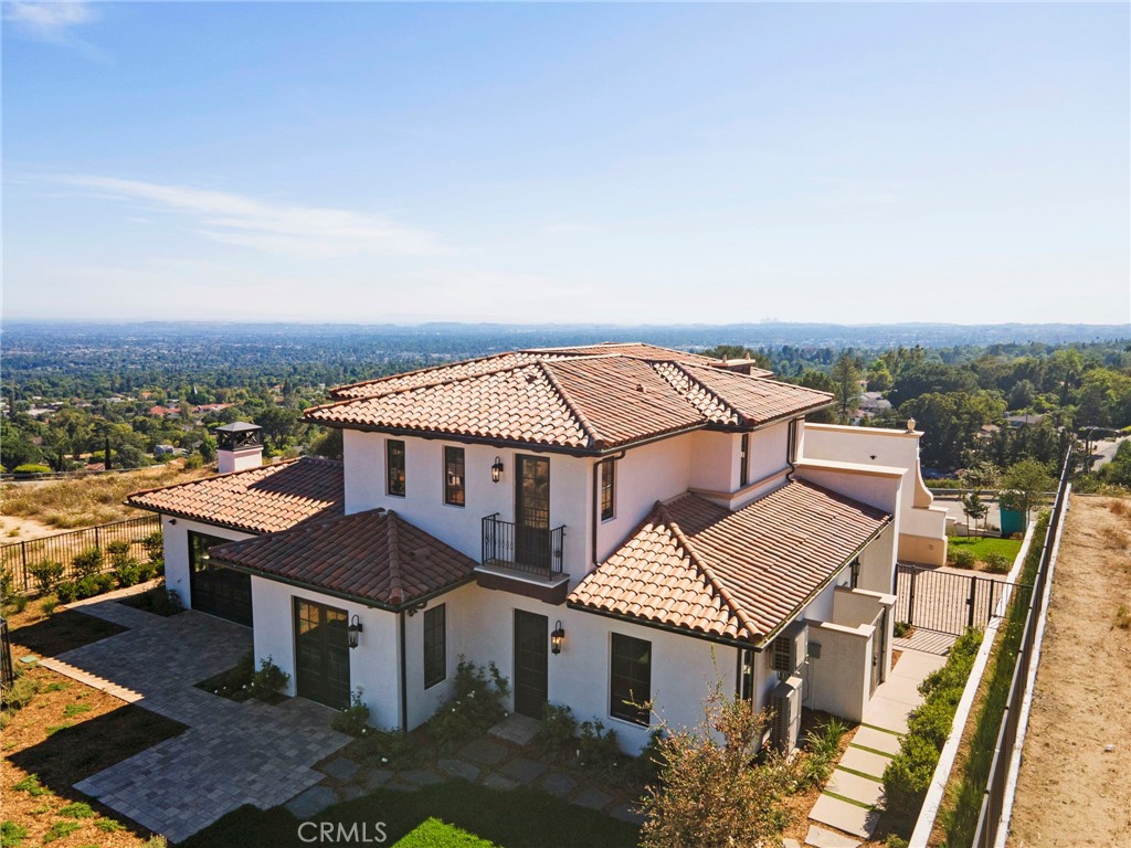 Introducing a Timeless Masterpiece in Sierra Madre
Perched atop the coveted north hillside of Sierra Madre—an area untouched by new development for decades—this newly constructed custom Spanish-style estate presents a once-in-a-lifetime opportunity. Cradled beneath the majestic presence of Mt. Wilson, the residence blends classic elegance with modern sophistication, setting a new standard in luxury living.
Born from Personal Vision and Passion
This home was built not for the market—but for the heart. Designed by the owner as their own sanctuary, every line, every material choice, and every finish reflects an uncompromising commitment to quality and comfort. No expense was spared, and no detail overlooked. From foundation to flourish, it stands as a testament to the builders dream design.
Panoramic Views. Impeccable Details
Enjoy stunning 360-degree vistas of the entire San Gabriel Valley—each sunset more breathtaking than the last. The interior showcases curated finishes: imported Italian marble countertops, artisan lighting fixtures, wide-plank hardwood flooring, and top-tier Thermador appliances. Amenities include a private elevator, built-in surround sound, centralized vacuum system, and integrated smart home technology—allowing seamless control of lighting, climate, and security from your phone or voice assistant.
Luxury Redefined
Every bathroom is outfitted with premium TOTO toilets, including electric bidets and seat warmers for ultimate comfort. A state-of-the-art water filtration system ensures purity throughout the home.
Endless Possibilities
Step outside and envision a future of serene indulgence: a city-approved infinity pool is ready to be built—perfectly framing this elevated retreat for leisure or elegant entertaining.
