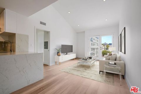 Photo of 11675 Darlington Avenue #301, Los Angeles, CA 90049 (MLS # 25621889)