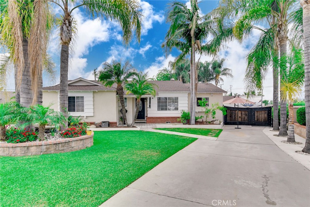 Beautiful West Covina POOL HOME - This home will make you feel like you are always on vacation. Beautifully landscaped with a variety of palm trees that make you feel you are on your own oasis. Has over $63,000 in upgrades in the past 3 years and not including an upgraded kitchen. Has new A/C, new flooring, plumbing including main line, cement work. This property is a must see. Main property has a nice large living room with crown moulding, recessed lighting, french doors leading out to enclosed living area that has two media rooms, office and a bedroom. Has an open kitchen with L shaped Quartz Island counter breakfast bar, newer off white cabinets, 5 burner stove with hood vent, single bowl stainless steel sink. Dining area off kitchen with octagon ceiling accents with recessed lighting. Has 3 other bedrooms, 2.5 baths, Large laundry room and walk in closet. Has a nice large pool between Recreation Room, Storage Room and 1000 sqft covered patio with balcony. Has half basketball court, bar area with palapa covering, has R.V. Parking. Storage sheds. Other living areas 1Bedroom and Studio Set-up.