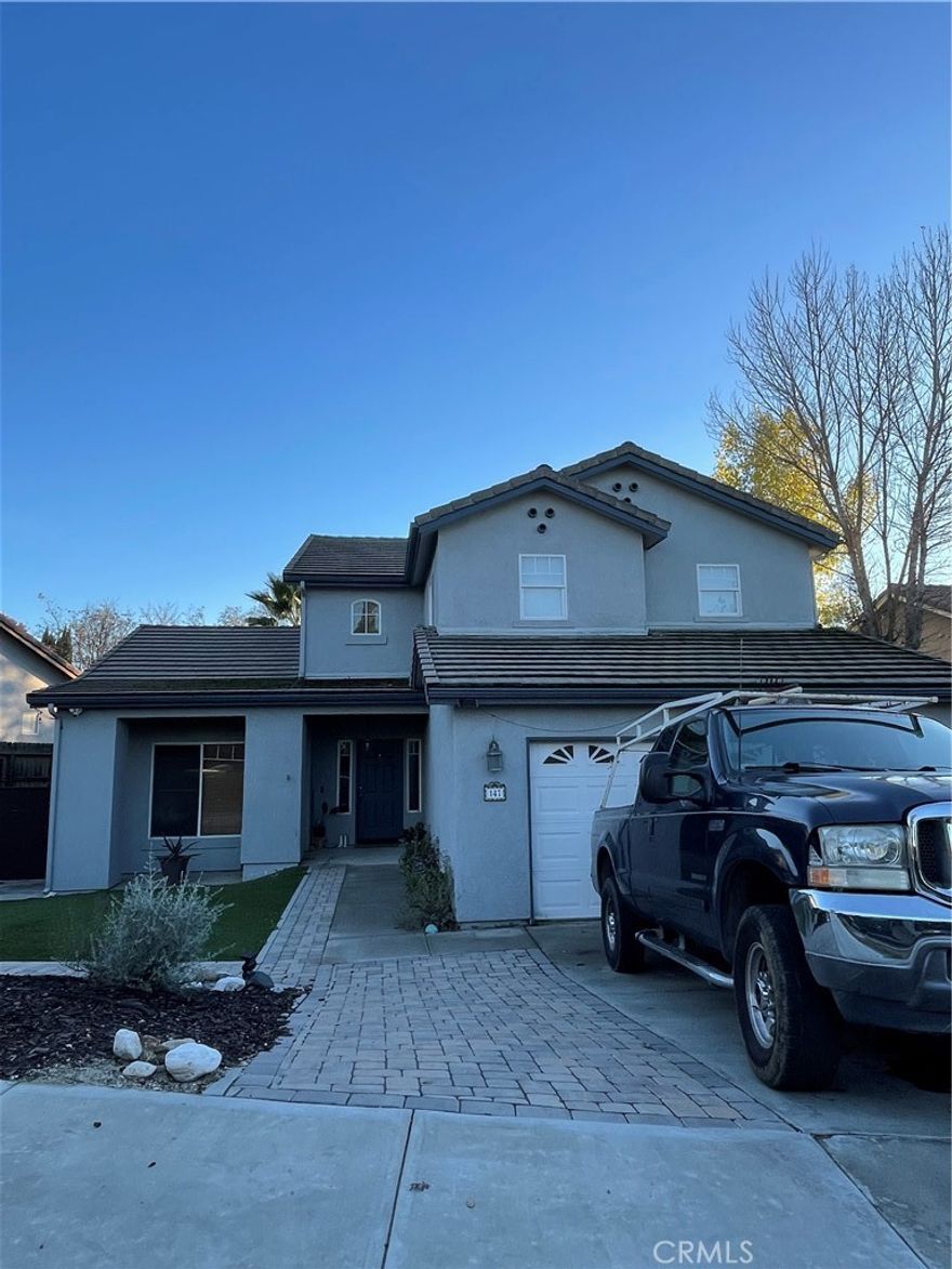 If the stars align and this home is right where you want to bring your family, we will make it work! There is a busy family living there and they will accommodate showings. Understanding this, photos are not currently available. This home offers 4 bedroom, 3 bathrooms and plenty of space for your family! The kitchen is open yet displays a full wall of cabinetry, an island and counter seating. It is open to the family room with french doors to the patio and a fire place. A spacious living room offers ample room for furniture and opens to a formal dining room which is adjacent to the kitchen with a walk-through opening. Upstairs you will find 4 bedrooms including the primary with ensuite featuring double sinks and a separate bathing tub and shower. The backyard has been improved to offer seating for entertaining family and friends and has a covered patio. The driveway has been expanded for ample parking as you will see upon touring the home. There is a Tuff Shed that was barely used and is included in the sale. The seller does not need to sell but does want to sell if someone sees it, falls in love with the location and can see the potential.