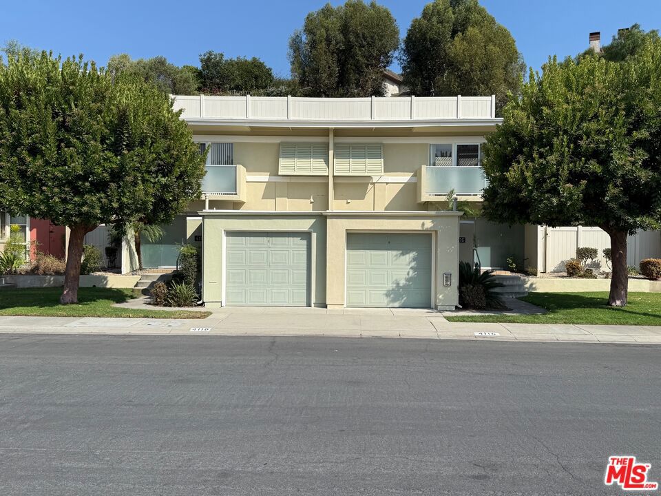 On acreage that had previously been home to pasture and training facilities for his family's thoroughbred racehorses, architect Clifton Jones Jr. developed a tract of distinguished garden home duplexes. Named Cerritos Circle, its modernist post and beam designs display the influences of his studies at the USC School of Architecture. Privacy in addition to a seamless connection between indoors and out is achieved by way of floor to ceiling glass walls directed at central courtyards for each residence. Situated on a more than 8,501 sf lot, with each unit having its own private patio and outdoor area. This combined with well planned layouts make the two 1,200+ sf homes feel much larger than their measure. As side by side units, each has the feeling of being its own single family home. They were designed in such a way that owners could live in one and rent out the other, with privacy between units having been a primary consideration in the design. Both feature 2 bedrooms / 1.5 baths, well organized island kitchens, and spacious open plan living/dining areas. Located in Long Beach's highly desired Los Cerritos/Virginia Country Club neighborhood: with tree lined streets, historic homes, excellent school district, adjacent Dominguez Gap Wetlands + nearby shopping, restaurants, and breweries of Bixby Knolls. Central location with easy freeway access for commutes to both Los Angeles and Orange County, and less than 1.5 miles from a metro station.