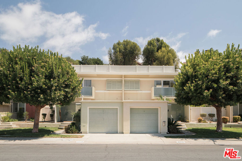 On acreage that had previously been home to pasture and training facilities for his family's thoroughbred racehorses, architect Clifton Jones Jr. developed a tract of distinguished garden home duplexes. Named Cerritos Circle, its modernist post and beam designs display the influences of his studies at the USC School of Architecture. Privacy in addition to a seamless connection between indoors and out is achieved by way of floor to ceiling glass walls directed at central courtyards for each residence. Situated on a more than 8,501 sf lot, with each unit having its own private patio and outdoor area. This combined with well planned layouts make the two 1,200+ sf homes feel much larger than their measure. As side by side units, each has the feeling of being its own single family home. They were designed in such a way that owners could live in one and rent out the other, with privacy between units having been a primary consideration in the design. Both feature 2 bedrooms / 1.5 baths, well organized island kitchens, and spacious open plan living/dining areas. Located in Long Beach's highly desired Los Cerritos/Virginia Country Club neighborhood: with tree lined streets, historic homes, excellent school district, adjacent Dominguez Gap Wetlands + nearby shopping, restaurants, and breweries of Bixby Knolls. Central location with easy freeway access for commutes to both Los Angeles and Orange County, and less than 1.5 miles from a metro station.