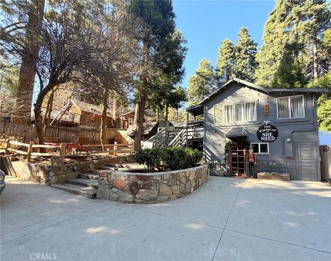 Photo of 926 Kuffel Canyon Rd, Lake Arrowhead, CA 92385 (MLS # IG25280711)