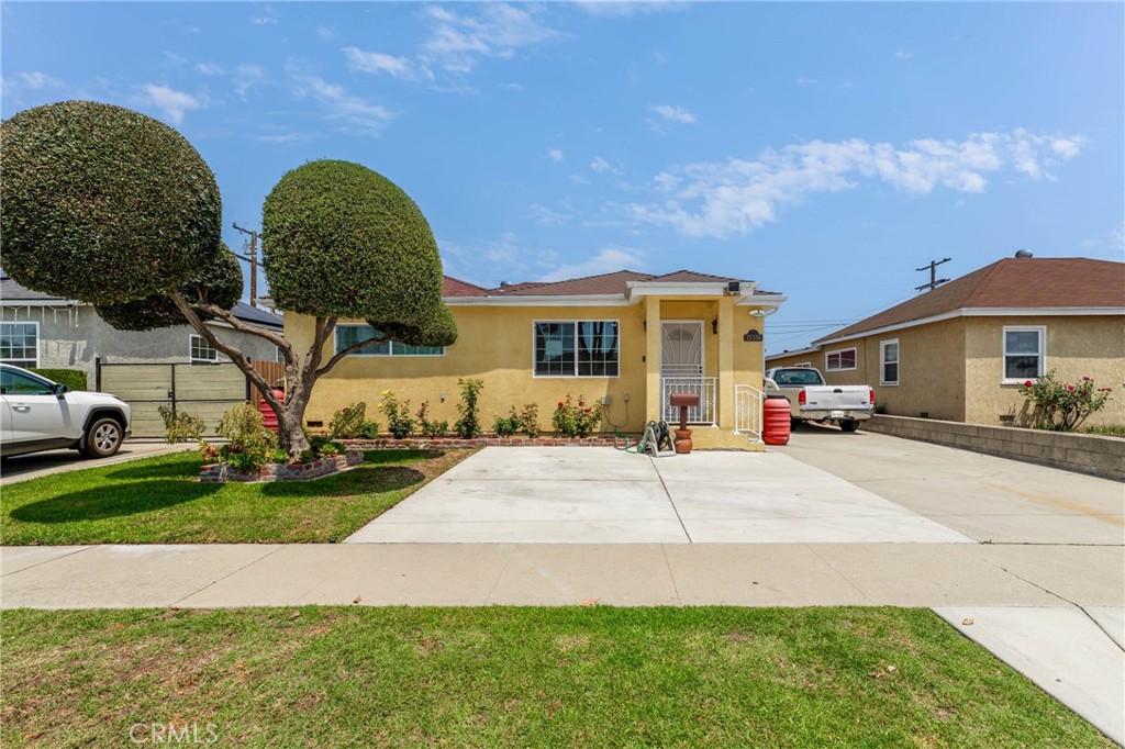Need a big home? Well you've found it! Great home in the city of Norwalk featuring 3 bedrooms and 2 bathrooms PLUS an ADU. This home has gone through some upgrades that make this home very appealing. Outside you'll notice the solar panels which are paid off. The driveway has been expanded for additional parking. Inside you'll find a large open space with tile flooring throughout. Upgraded windows allow plenty of natural light in the house. The kitchen features upgraded cabinets, granite countertops and a dining space adjacent to it. Both bathrooms have been remodeled and show very well. The garage has been converted into a studio ADU detached from the house. There is a water filtration system included with the sale. The backyard is private and has plenty of space to enjoy your Bbq's. Come by and take a look!