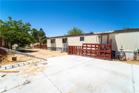 Photo of 3576 Whispering Pines RD, Phelan, CA 92371 (MLS # CV26145385)