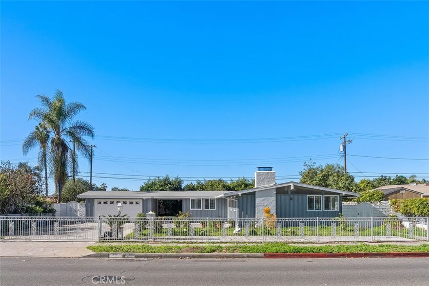 Prime Anaheim Location! This spacious 3-bedroom home offers comfort, privacy, and convenience in one of Orange County’s most desirable neighborhoods. The inviting family room features a cozy fireplace, flowing into a comfortable dining area, and a kitchen with a center island perfect for added seating and casual entertaining. Bedrooms offer independent access to multiple outdoor spaces, enhancing the home’s airy feel. Additional highlights include central AC/heating, a detached two-car garage, and a large driveway with parking for up to five vehicles. The expansive backyard, lined with mature fruit trees, provides a relaxing and private setting. Ideally located near premier dining, shopping, entertainment, and major freeways. A rare lease opportunity!