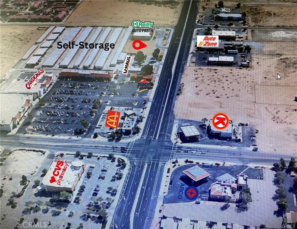 The vacant lot location is in a bustling commercial area that is surrounded by a wide range of established businesses. Such as O'Reilly auto parts, U-Haul, Pizza Hut, Mcdonald's, and Cardenas Market, including retail outlets, and Gas Stations. This makes it an attractive location for businesses looking to establish a presence in a high-traffic area of approximately 28,000 CPD as your potential future built-in customer base. This land is located in a prime commercial area and is ideally situated in close proximity to the street for maximum visibility. The property is currently developed and offers a unique opportunity for a commercial developer or investor to build a structure that meets their specific needs and requirements. The lot's location in a bustling commercial area means that it is surrounded by a wide range of established businesses. This makes it an attractive location for a business looking to establish a presence in a high-traffic area with a built-in customer base. Furthermore, the property's proximity to the street offers maximum exposure to passing vehicular and pedestrian traffic, ensuring that any business that sets up on this lot will have high visibility and easy accessibility. This is especially important for retail businesses or restaurants that rely on foot traffic and drive-by customers. Overall, this vacant land is an excellent investment opportunity for those looking to develop a commercial property in a high-traffic location with excellent exposure and visibility. With its prime location and potential for development, it presents a unique opportunity for investors or developers to create valuable property.