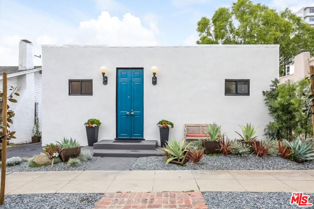 This done, done, done, light & bright, Norma Triangle Greek-inspired property delivers high-end living in WeHo's hottest, most walkable neighborhood. Within minutes from your home, you'll find dozens of LA's world-famous eateries, shops, and venues to explore. When you are interested in escaping, simply shut the double entry doors to enjoy the open concept, warmly modern space that features 2 master suites, each with en-suite bathroom, walk-in closet and high-end finishes. The original hardwood floors are lightly stained to complement the furnished modern decor and professionally designed space that is filled with natural light. The chef's kitchen features professional grade appliances, a large island, custom cabinetry, and ample counter space wrapped in beautifully selected granite and marble. Outside, an immaculately created, easy up-keep yard allows for entertaining, charity events, or summer BBQ. There are 2 bdrms w/bonus room outside which can be a 3 bdr if needed. Walk Everywhere!