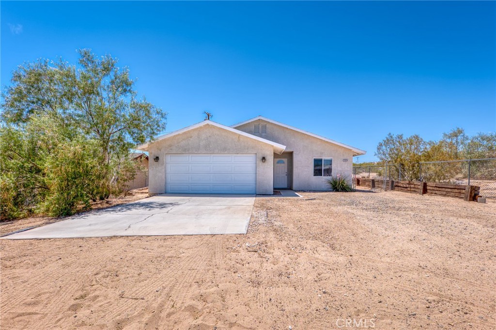 This 3 bedroom 2 bath gem is the one you've been waiting for. Priced to sell quickly. New tile floors throughout, new lighting fixtures, central heating and air, there is also an evaporative cooler for your comfort. Centrally located, near shopping and restaurants, also just a few miles to the east entrance of Joshua Tree National Park.
Make time to view this one, you'll be glad you did.