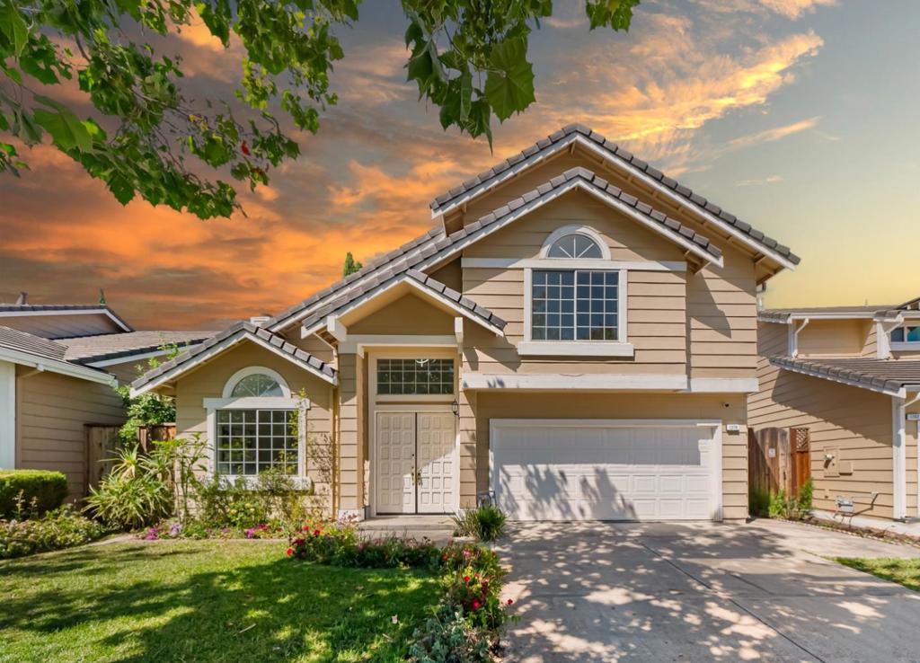 Welcome to this two-story single-family home in the convenient Berryessa area of San Jose. The bright living room features vaulted ceilings, an arched window, and a pendant light. The connected dining area includes a second pendant light. At the back is a gourmet kitchen with granite countertops, white cabinetry, and modern appliances, flowing into a family room with a cozy fireplace. A sliding door opens to the backyard for seamless indoor-outdoor living. Recessed lights throughout. Newly installed laminate flooring. A powder room is located nearby for added convenience. Upstairs, the primary suite offers a spacious bedroom with vaulted ceiling and arched window. The en-suite bathroom includes double sinks with a large mirror, skylights, and a shower over jet tub. Two additional bedrooms serve family or guests, with a hallway bathroom featuring granite countertops and a shower over tub. The home includes an attached two-car garage and in-unit washer and dryer. Enjoy nearby restaurants, shopping, and grocery stores. Close to the golf course, Berryessa BART Station, and the private Challenger School Berryessa. Easy access to major highways 101, 880, and 680. Short commute to tech companies. Don't miss this great opportunity!