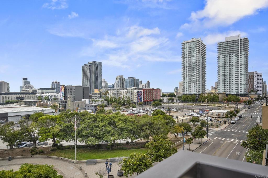 Welcome to your dream urban retreat in the heart of Downtown San Diego! This rarely available top-floor, true 3-bedroom condo is located in the luxurious and highly sought-after Union Square complex—where upscale city living meets everyday comfort. Built in 2004, this light-filled home features soaring ceilings, expansive south-facing windows, and an open floorplan ideal for both entertaining and relaxing. The upgraded kitchen boasts granite countertops, rich cabinetry with extra storage, and stainless steel appliances. Step out to your private balcony—or head upstairs to your exclusive rooftop patio (resurfaced and repainted in June 2025) with new lighting, perfect for unwinding, hosting, or stargazing. Additional perks include built-in closet organizers, dual-paned windows for quiet, extra storage above two garage spaces, and access to premium amenities: an onsite gym, spa, saunas, clubhouse, secure bike/scooter storage, and weekday office staff with 24-hour weekend security. Whether you’re investing or settling in, this is a rare opportunity to own a top-tier unit with the best of San Diego at your doorstep!