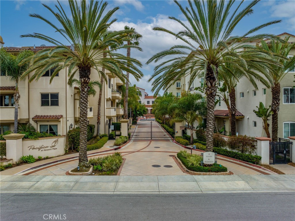 Welcome to Pacifica at Newport Plaza, a Mediterranean resort-style penthouse where urban luxury meets coastal living. This two-level penthouse condo is designed for modern living—think of it as your own 5-star retreat in the heart of one of Orange County’s most exciting neighborhoods. Step inside this fully remodeled home and you’re greeted by high-end finishes, including fresh custom paint, solid core doors, smooth finished walls, white oak wood flooring, 10’ coffered ceilings, premium appliances, and sleek designer fixtures. The chef’s kitchen is built to impress, featuring an oversized sink and island, Wolf range with custom hood, 48-inch Sub-Zero built-in refrigerator and a walk-in pantry—perfect for hosting friends or crafting a quiet night in. The open living and dining spaces are flooded with natural light through oversized sliding windows offering panoramic views. Directly off the first floor you will find an oversized 700 sq. ft. rooftop terrace which makes for an entertainer’s dream while offering expansive views of sunsets, city lights and a peek-a-boo ocean view. The primary suite feels like a personal spa, with a large walk-in closet, marble slab counters, soaking tub, walk-in shower, and a private patio for your morning coffee. The guest suite includes an en-suite bath as well as a walk-in closet and patio access. The 20x29 oversized 2 car garage offers extra space for surfboards and bikes. Additionally, there are ample guest parking spaces. This community delivers top-tier amenities, including a pool, spa, large green belt for pets, secure elevator access, and gated entry. Living here means you’re just steps from Costa Mesa’s best restaurants, bars, and nightlife including Social, Il Dolce, Eat Chow, Café Sevilla, and Triangle Square’s vibrant mix of dining, movies, bowling, and nightlife. Newport Beach is just minutes away for morning runs, bike rides, or relaxing days in the sun. With quick freeway and airport access, this location puts you at the center of Orange County’s dining and entertainment scene, this penthouse offers the ultimate lifestyle upgrade for those who want more than just a home, it’s a hub for everything you love.