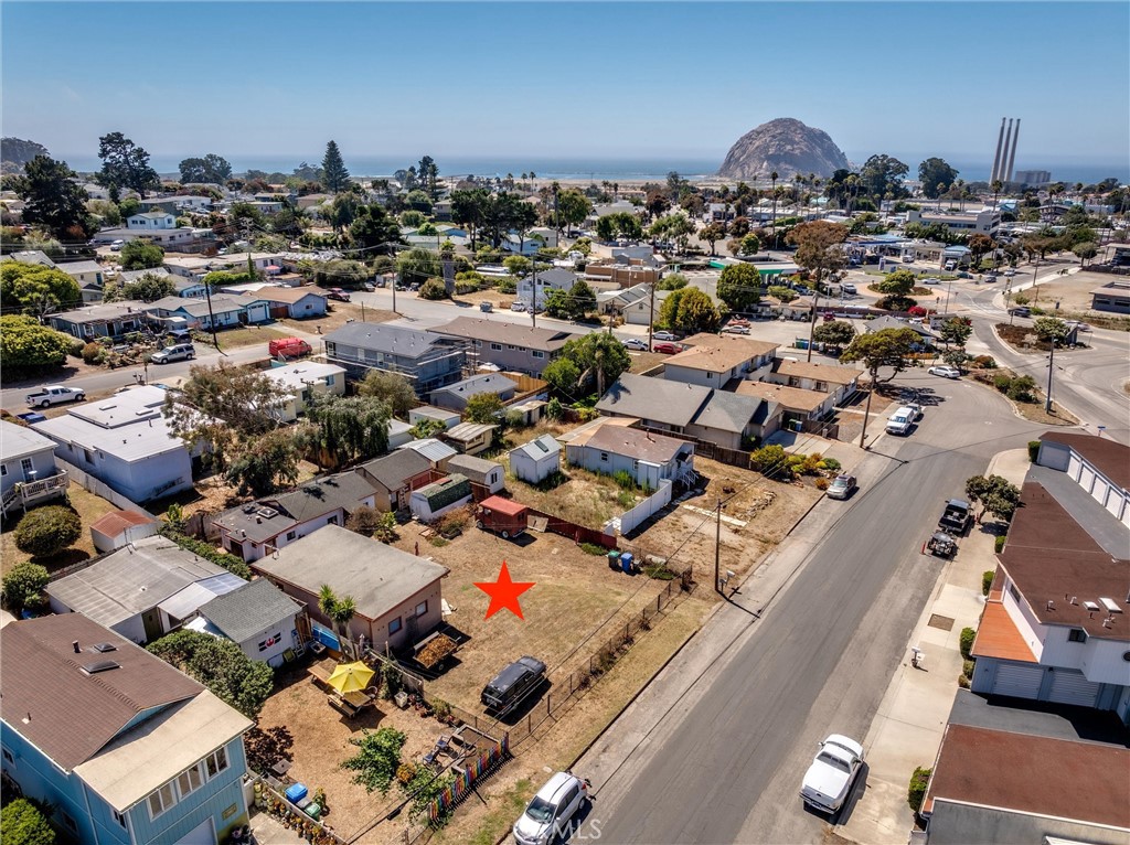 Starter home opportunity in Morro Bay’s sought-after “Lower Heights” neighborhood! This 1-bedroom, 1-bath home is the perfect canvas for a buyer ready to roll up their sleeves and build instant sweat equity. Sitting on two legal lots totaling 7,000 sq. ft., the property offers ample space and flexibility just minutes from downtown and shopping. Two outbuildings add to the potential—one a main garage with workshop area, and the other located near the residence with possibilities limited only by your imagination. A rare chance to create value and vision in an excellent location!