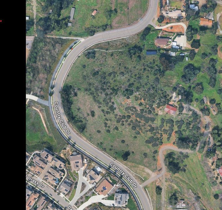 An exceptional opportunity awaits in the highly sought-after community of Harmony Grove, CA. This 3.84-acre parcel offers endless potential, whether you envision building your dream estate on a spacious and private lot or exploring the possibility of subdividing. Nestled directly across the street from a well-established neighborhood with homes ranging from $1.2M to $2.25M, this property presents a rare chance to own substantial land in a premium location. Potential access can be negotiated via a driveway on the south end of the neighboring lot, owned by the local HOA, or alternatively from Country Club Drive, where utilities are readily available. Enjoy a peaceful, rural setting with the convenience of being just minutes from I-15, shopping, and the vibrant coastal town of Encinitas. Close to Elfin Forest Recreational Reserve with awesome hiking or San Elijo. Whether you're a builder, investor, or homeowner with a vision, this land offers the perfect blend of location, lifestyle, and potential.