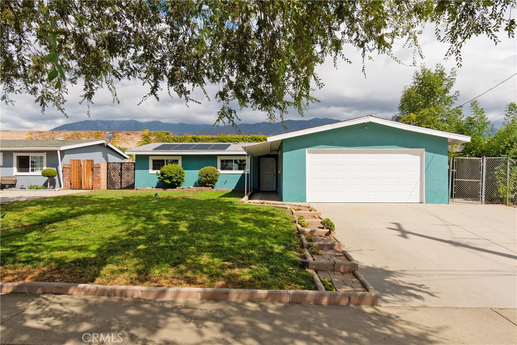 Welcome to this fully remodeled, turnkey single story home nestled in a quiet cul- de- sac in the lovely city of Rancho Cucamonga just off the 210 fwy. This home has it all 4 bedrooms with 2 bathrooms, formal dining & living room, huge family room that opens to a large bonus room of 300 sq ft. The house has been enhanced with new roof, new freshly interior paint, Newer wood flooring through out the whole house, Newer recessed lighting, New doors, Newer dual pane windows for improved energy efficiency & insulation, Newer HVAC unit that was installed in 2017, Newer water heater, Newer garage opener with key pad, 2 updated fireplaces in family & living room, upgraded kitchen cabinets & drawers with pull out shelves & self closing cabinet doors & drawers, water softener for good quality water through the house & extra filters for drinking water in kitchen, alarm system for extra security. Very good size backyard with Mountain View & spacious storage shed, 2 attached car garage with 220V electric car charger,
Leased Solar panels which is an incredible saving in the electric bill and need to be assumed by buyers for around $146/month.
This house is centrally located near the 210 fwy, major shopping centers, parks, everyday amenities and within the incredible Alta Loma School District.
Hurry this house is ready, just move in.