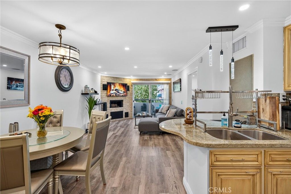 Photo of 5550 Owensmouth Ave #107, Woodland Hills, CA 91367 (MLS # SR25234950)