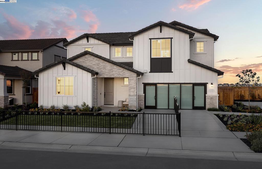 Plan 2 offers an ADU as well as open concept living with a well-appointed gathering room, gourmet kitchen with large island and walk-in pantry. Three secondary bedrooms, a spacious loft, and a primary suite are perfect for relaxing.