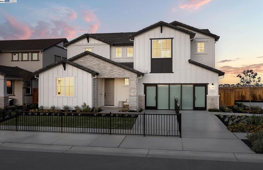 Plan 2 offers an ADU as well as open concept living with a well-appointed gathering room, gourmet kitchen with large island and walk-in pantry. Three secondary bedrooms, a spacious loft, and a primary suite are perfect for relaxing.