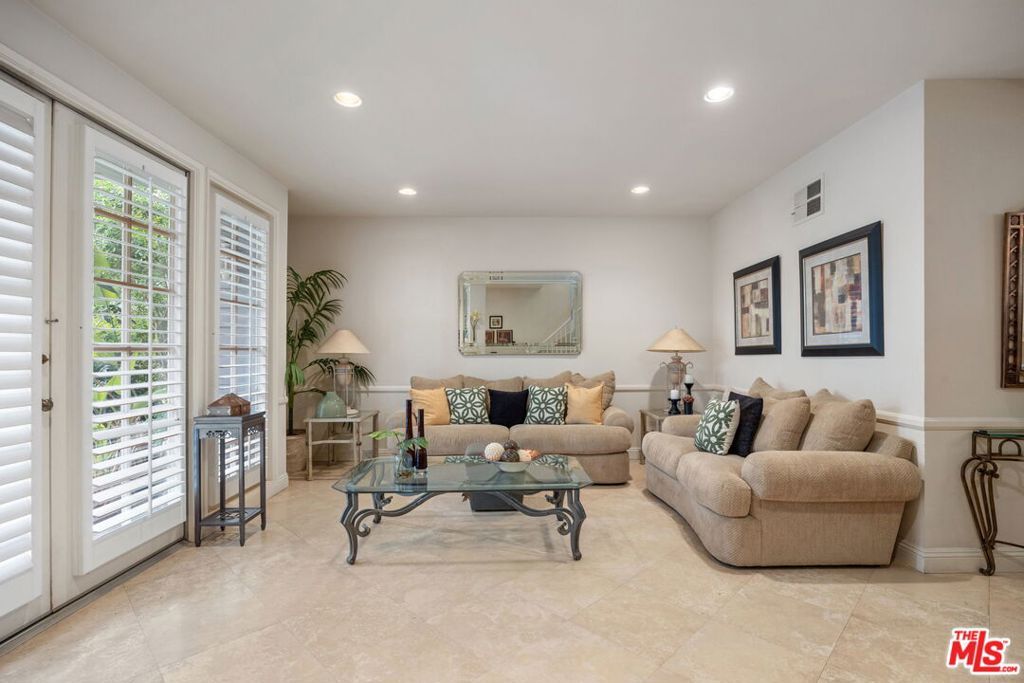 Photo of 18135 Burbank Boulevard #8, Tarzana, CA 91356 (MLS # 25619105)