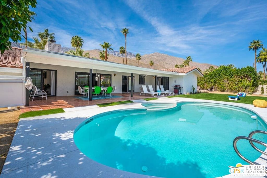 Season | October - April: $$ - 8,175.00 per month Summer | May - September: $$ - 4,220.00 per month Available for Seasonal Rental Only 1 to 6 Months. This property is offered exclusively for short-term seasonal stays. Long-term leases beyond 6 months are not available. Welcome to the Luxury Mid-Century Retreat in the Heart of the Historic Movie Colony in Palm Springs, CA. This stunning 3 bedroom, 2 bathroom house is the perfect blend of modern amenities and classic charm. Enjoy the comfort of air conditioning, heating, and Wireless Internet throughout the home. Relax in the private swimming pool or hot tub, or gather around the BBQ grill for a delicious meal. With essentials like a high chair, pack 'n play/travel crib, and free parking on premises/street, this retreat has everything you need for a memorable stay. Don't miss out on this unique opportunity to experience the best of Palm Springs living in this beautiful vacation rental.