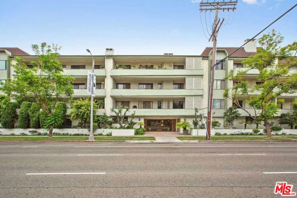 Beautiful, spacious 2 bedrooms, 2 bath condo. It is in a fabulous location, close to West Hollywood, Beverly Hills and Cedar Sinai medical center. In a quiet well sought neighborhood. This unit has a very spacious comfortable living and dinning area with newly installed hardwood floors, a wet bar with display shelving, fireplace and small balcony. Large coat closet in entry hall. Security building with gated garage and two enclosed parking spots. Heated pool spa, exercise room and meeting room. The building is walking distance to the Beverly Center, Trader Joe's, restaurants, theaters, shops and more.