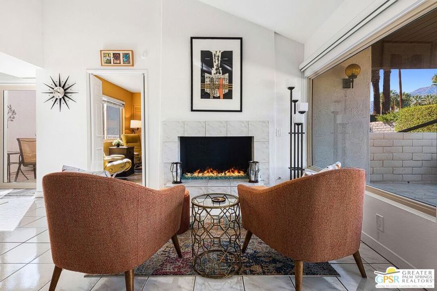 Incredible opportunity to own a Hugh Kaptor designed 3BR/2Ba residence in the heart of South Palm Springs! The living room features high vaulted ceilings with a fireplace and wall of glass overlooking your private southwest covered patio and impressive majestic mountain views that invite an abundance of natural light in an open layout perfect for relaxation or entertaining. New double pane windows and glass sliders throughout the home ensure energy efficiency, peace and quiet. The bright kitchen with new quartz countertops opens to the dining area which also opens through double pane glass sliders to an additional south facing private patio. The generous primary suite with ensuite bathroom and the guest bedroom, across the hall from the second bathroom which serves as your powder room when entertaining, both feature stunning direct San Jacinto Mountain views. The third bedroom is on the opposite side of the home and currently set up as an office/den. Washer/dryer is located conveniently in residence, and there is also a detached one car garage. Nestled within a beautifully maintained community known for its lush grounds, sparkling pool and spa, tennis/pickleball courts, and a dog park, this home offers the best of Palm Springs resort living. HOA includes cable, internet, roof and landscape maintenance. The property is within walking distance to restaurants, shopping, markets, and just a short drive to downtown and the Palm Springs airport.