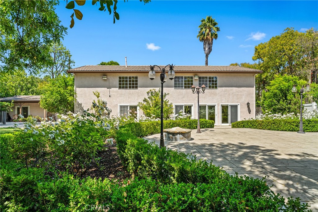 Classic California Charm in Prime Tarzana
Welcome to 19016 Wells Drive, a timeless 4-bedroom, 4-bathroom residence nestled on a lush 0.43-acre lot in one of Tarzana’s most desirable neighborhoods. Spanning approximately 4,514 square feet, this elegant fully gated and secured two-story home, blends classic character with modern comforts.
The spacious floor plan offers a perfect balance of warmth and functionality, featuring generous living areas, a cozy fireplace, and central heating for year-round comfort. A highlight of the property is the private backyard oasis, complete with a sparkling in-ground pool — perfect for relaxing or entertaining.
Additional highlights include ample parking, mature landscaping, and significant long-term value potential in a highly sought-after community.
Located on a quiet, tree-lined street, this home offers privacy while remaining close to excellent schools in the Los Angeles Unified School District, including Wilbur Charter Elementary, Portola Middle, and Taft Charter High.