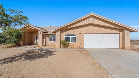 Photo of 12858 Atsina RD, Phelan, CA 92371 (MLS # CV26183674)