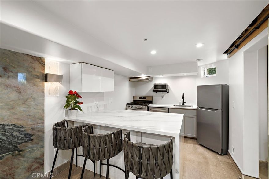 Welcome to your coastal retreat in Laguna Beach, where style meets comfort in this newer ground-level studio. Filled with natural light, the open living space is enhanced by sleek modern finishes that create a polished and inviting atmosphere. The kitchen is appointed with modern appliances, while the bathroom features an elegant walk-in shower that brings a touch of spa-like luxury. Convenient laundry access and ample storage make everyday living effortless. With the added benefit of your own parking space and a prime location just moments from Laguna's beaches, restaurants, galleries, and shops, this studio offers the ideal blend of coastal charm and modern convenience.