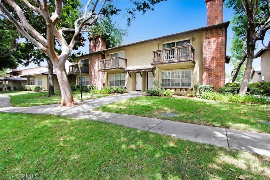 Spacious 3-bedroom, 3-bathroom condo offering comfort, functionality, and style throughout. This home features two master suites upstairs, each with its own private bath and elegant marble flooring, plus walk-in and wall closets for ample storage. The main living area showcases a cozy fireplace and rich hardwood floors that extend seamlessly through the downstairs.



A third bedroom downstairs provides versatile space for guests, family, or a home office. The galley kitchen is complemented by a pantry bar area, ideal for entertaining, and opens to a charming tiled patio filled with natural light. Additional highlights include several skylights, an attached two-car garage, and thoughtful modern finishes throughout.



This inviting condo perfectly balances warmth, convenience, and sophistication—ready for you to call home.