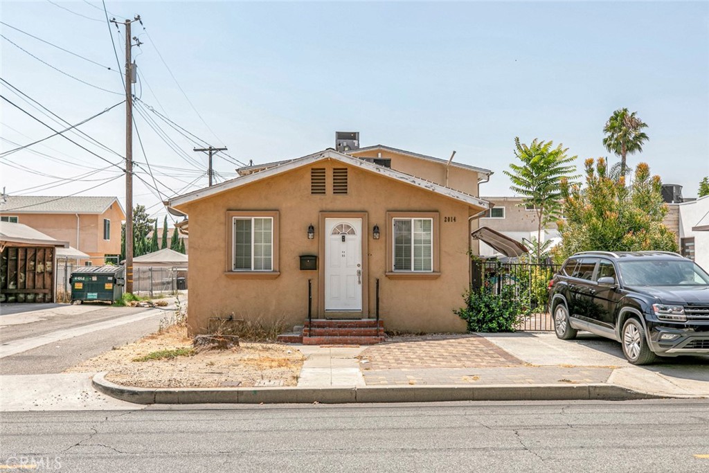 Prime Burbank Investment Opportunity with Dual Income Potential
Presenting a rare chance to own two separate residences on a single lot in the heart of Burbank: 2014 and 2016 Peyton Avenue. This well-maintained property offers excellent income potential, with each unit featuring separate gas, electric, and water meters. Tenants are responsible for all utilities and waste disposal, making this a low-maintenance investment.
Both homes are equipped with central air conditioning and heating, ensuring year-round comfort.
- 2014 Peyton Avenue (Front Unit):
A charming single-story residence featuring 2 bedrooms, 1 bathroom, and an uncovered parking space. Thoughtfully updated and filled with natural light, this home offers a comfortable layout ideal for long-term tenants or owner occupancy.
- 2016 Peyton Avenue (Rear Unit):
A spacious two-story home with a flexible floor plan. The upper level offers 2 bedrooms, 1 bathroom, and a balcony off the living room—perfect for enjoying Burbank’s pleasant climate. The lower level includes bonus space, an unpermitted kitchenette and an unpermitted bathroom, adding versatile options for extended living or guest quarters. The unit also features a two-car garage for added convenience.
Both residences have been tastefully remodeled and are meticulously maintained, reflecting true pride in ownership.
Whether you're looking to invest or occupy one unit while renting the other, this exceptional property delivers strong rental income potential in a desirable location.