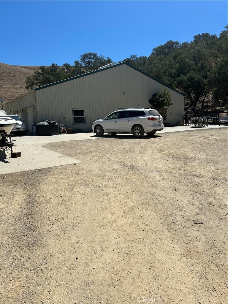 Wonderful 122 acre parcel with rolling hills, pastoral views and privacy just 15 minutes to Highway 101 and 20 minutes to Paso Robles. Off the grid living with solar and generator for power, well and septic. Home was built to be energy efficient. It has an open floor plan with a woodstove for heating the main area. Walk in closets in bedrooms and walk in pantry for extra storage. 3 bedrooms and 2.5 baths are spacious. Recessed lighting and ceiling fans for comfort. Large garage has plenty of room for vehicles and toys. Separate building houses the solar equipment and generator. Escape the noise from city life and enjoy your own paradise. More than enough room to raise animals, plant crops, hunt or play.