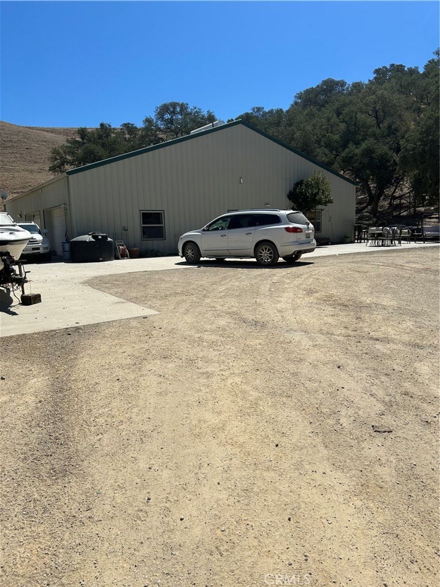 Wonderful 122 acre parcel with rolling hills, pastoral views and privacy just 15 minutes to Highway 101 and 20 minutes to Paso Robles. Off the grid living with solar and generator for power, well and septic. Home was built to be energy efficient. It has an open floor plan with a woodstove for heating the main area. Walk in closets in bedrooms and walk in pantry for extra storage.  3 bedrooms and 2.5 baths are spacious. Recessed lighting and ceiling fans for comfort. Large garage has plenty of room for vehicles and toys. Separate building houses the solar equipment and generator. Escape the noise from city life and enjoy your own paradise. More than enough room to raise animals, plant crops, hunt or play.