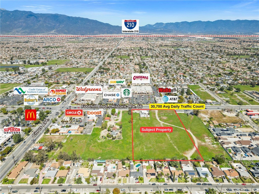 4.1 acres of prime walkable mixed use zoning land available for SALE! This exceptional location presents a prime development opportunity in Fontana's rapidly expanding Foothill Blvd./Route 66 corridor. With approximately 300 FEET of FRONTAGE along a highly visible section of Foothill Blvd./Route 66 between Citrus Ave. and Oleander Ave. The property is strategically positioned across from the established Citrus Shopping Center anchored by Cardenas and Walgreens outparcel at the crucial Citrus Ave. intersection. Its location offers convenient access to Downtown Fontana, Sierra Ave., Victoria Gardens in Rancho Cucamonga, and major freeways including I-210, I-15, and I-10, as well as being a Route 66 Gateway. Zoned for Walkable Mixed Use (WMXU) under Fontana's Form Based Code (FBC), the site allows for diverse development options, including retail, medical, restaurant, office, mix-use commercial/residential or multi-family residential up to 39 UNITS PER ACRE! Fontana's significant population and median household income growth, coupled with a booming development landscape, make this a highly desirable location. With high traffic counts of over 30,000 vehicles crossing this property daily, this location has fantastic exposure! This is a great opportunity and unique chance to capitalize on the city's dynamic growth with exceptional visibility and potential!