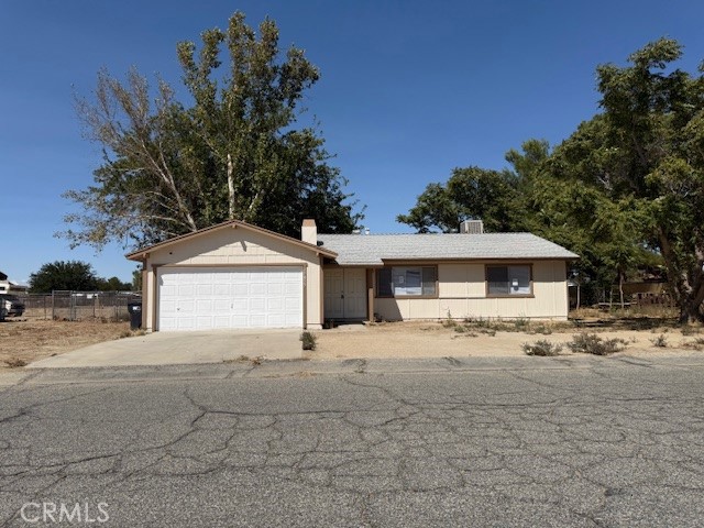 Very nice and affordable ranch home in Lake LA! This home is located within the southern end of Lake LA, which has scenic mountain views. This home is loaded with upgrades, including new interior & exterior paint, new carpeting, new appliances, new kitchen counters, new light fixtures, new bathroom vanity & commode, and much more. Nice floorplan with fireside living room, and 1 of the bedrooms has a convenient door to the bathroom. 2 car attached garage. Large cross-fenced lot with street access at the rear of the yard. This home shows well and is ready for quick move-in. Eligible for FHA financing. Great opportunity to own an affordable ranch home with extensive upgrades. Don't miss out!
