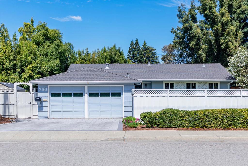 Newly remodeled stunner with over $120K in upgrades, located in the coveted Cuesta Park neighborhood. Less than two miles from downtown Mountain View with Caltrain/light rail connections, situated in a Top-Rated school district, with most schools just a short walk away. Inside, enjoy new SPC floors, upgraded electrical, new A/C, updated bathrooms, recessed lighting, dual-pane windows and cozy updated fireplace. The kitchen features stainless steel appliances, including a professional 6-burner Viking gas range, granite countertops, oversized sink, vast cabinet space, pantry and dining area. Down the hall, find three spacious bedrooms with large closets. The primary suite boasts a new closet and refreshed en-suite bathroom with stall shower. Additional highlights include a two-car garage with new LG washer/dryer and a sink, newly fenced front yard with artificial turf (front/back), plus a beautifully landscaped backyard with new paver stones (also on driveway/walkway), colorful flowers, mature trees and a shed. All this, just steps from the iconic Cuesta Park and close to grocery stores, YMCA, shopping centers, hospitals, major tech campuses like Apple, Google and LinkedIn, with easy access to highways 85, 101, and 237. Don't miss this beautifully remodeled prize! It will go FAST!
