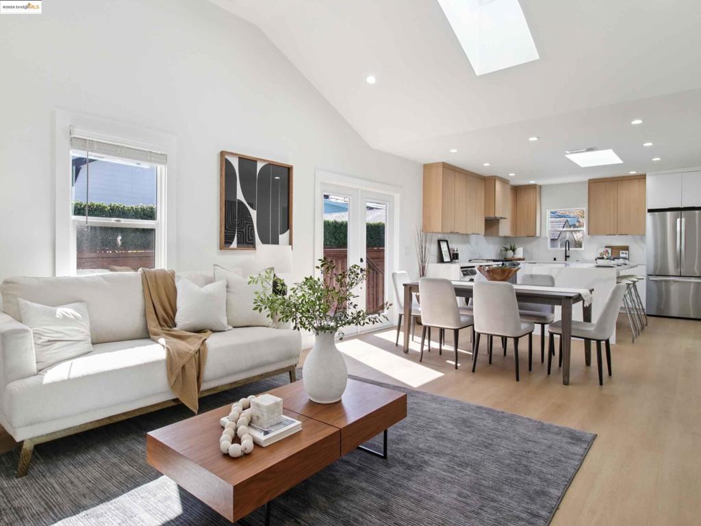 A true gem has arrived in Central Berkeley. Welcome to 1612 Carleton Street: a fully permitted, down-to-the-studs remodel & addition that’s been thoughtfully updated with all-new systems including electrical, plumbing, and a high-efficiency heat pump for year-round comfort. This 2-bed, 2-bath home perfectly blends contemporary style with timeless appeal. Discover vaulted ceilings & strategically placed skylights that fill the home with natural light. The bright modern kitchen boasts stainless steel appliances, sleek quartz countertops, under cabinet lighting & waterfall island w/ seating. The thoughtful layout flows seamlessly into the open floor plan living room. The primary suite offers a serene retreat w/ glass doors leading to the redwood deck, keeping you connected to nature. Outside, enjoy your private oasis with a grassy lawn perfect for lounging & outdoor dining and a large shed for your storage needs. Additional features include washer and heat pump dryer, new insulation throughout, new roof, recessed lighting, new floors & tankless water heater. Located in the heart of Berkeley you're minutes away from Cal, Berkeley Bowl, BART & hundreds of cafes, restaurants & small businesses. Don't miss this rare opportunity to live the Berkeley lifestyle in modern luxury.
