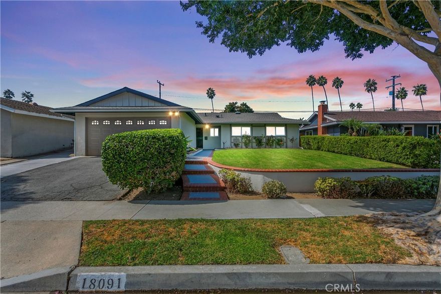 Embrace the ultimate Southern California lifestyle! This beautifully maintained 4-bedroom, 2-bath residence offers the perfect blend of comfort, style, and location. Step into a light-filled living room featuring a cozy fireplace and sliding doors that lead to an expansive, tranquil backyard with a covered patio—ideal for BBQs, entertaining, and al fresco dining. The spacious kitchen boasts ample cabinet space and a dedicated dining area.

The primary suite is generously sized, complemented by large secondary bedrooms and upgraded bathrooms with tiled enclosures.

This home is in immaculate, move-in-ready condition, featuring solar panels, a brand-new roof, new quiet cool house fan, fresh interior and exterior paint, double-pane windows, and newer, quality laminate flooring. Additional features include a two-car garage with laundry hookups and a long driveway. Enjoy a prime location within the award-winning Ocean View School District, close to shopping, dining, freeway access, and just minutes from the beach and Downtown Huntington Beach. Rent includes high speed WIFI (fiber/FiOS 5 Gig, approx. $150/month); electricity (up to $200/month), and weekly gardening services. Exceptional value for comfort and quality!