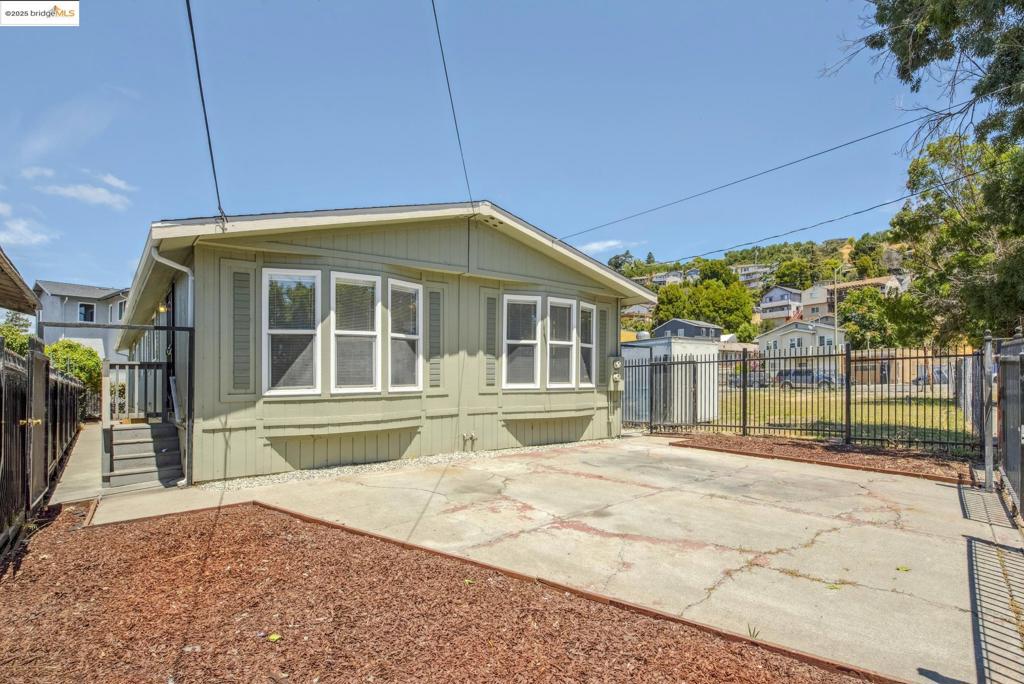Amazing opportunity to own a side by side updated duplex. Each unit comprised of 3 bedrooms & 2 bathrooms w/ their own private parking & yards, endless in/outdoor spaces to entertain, garden & let your hobbies take hold. An open-concept floor plan w/ an updated kitchen, vaulted ceilings, 3 generous bedrooms w/ access to 2 updated bathrooms. Each unit has its own in-unit laundry, separate gas & electric meters. Shared water meter for both units. Private gate secured off street parking for 4 cars. This investment is great for large extended families needing space, first time home buyers/investors looking for additional income & or combine both units to make one large house. Endless options & opportunities to make this one into your next best investment. This property is a manufactured home on a permanent concrete foundation & may not qualify for traditional financing. Buyers to consult w/ their agents & lenders to confirm. Located on a quiet street while also being mins away from local restaurants, shops, transportation & all that the Bay Area has going on. This turnkey duplex has it all & more to offer & it is waiting for its new owner!