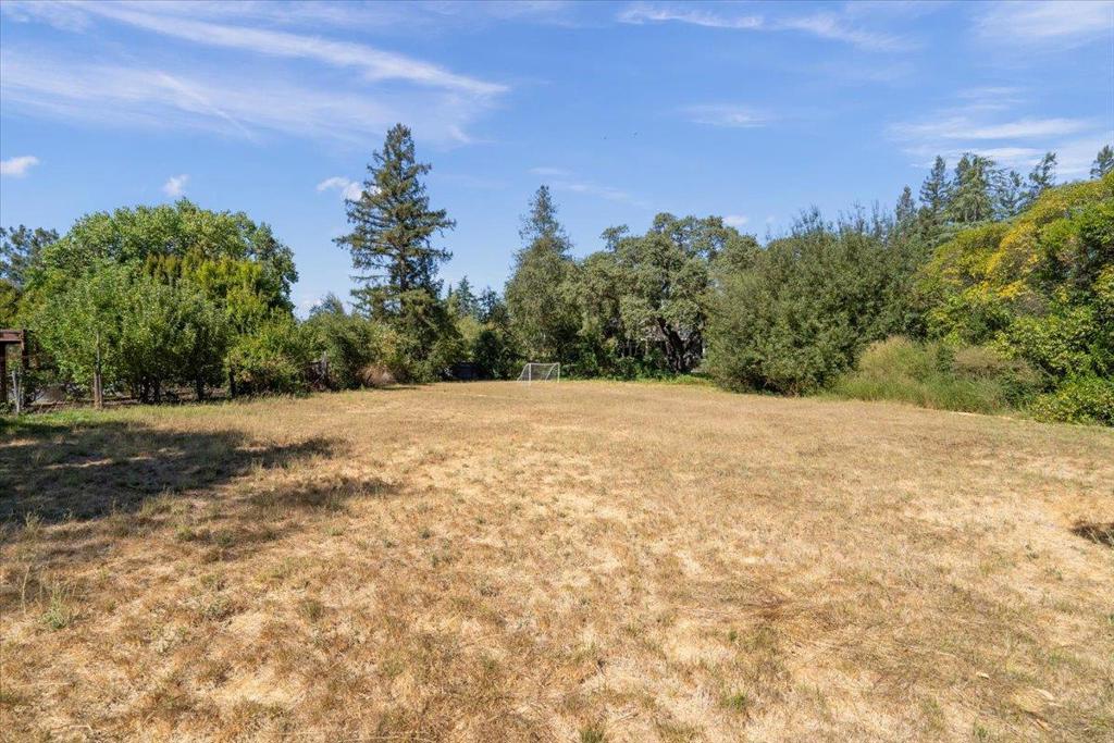LOT 2 - Pennant Properties along with Design by Mish are pleased to present this one-of-a-kind dream custom home opportunity on cherished Bonnie Lane in Los Gatos, CA. 16460 B Bonnie Lane (Lot 2) is 21,546 SF of almost flat buildable land situated in a highly desirable location in Los Gatos. The opportunity is to purchase the rear parcel for a beautiful custom home development. The lot is the result of an SB9 Urban Lot split. Lot 2 is accessed via a private driveway and is nestled in a beautiful and private secluded area abutting Ross Creek. Pursuant to SB9 a building permit can be secured ministerially in just a few months, not years, so the project can be under construction much more quickly. Further details can be provided on this incredible time-saving entitlement. Public website is property address in typical format. Search for the address in any search engine to find the website with concept plans and more details.