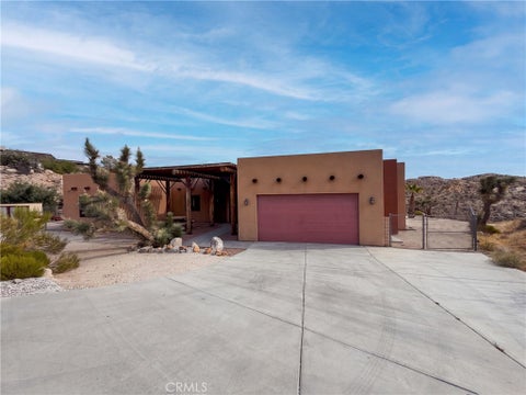 Photo of 5935 Buena Suerte RD, Yucca Valley, CA 92284 (MLS # IV26188950)