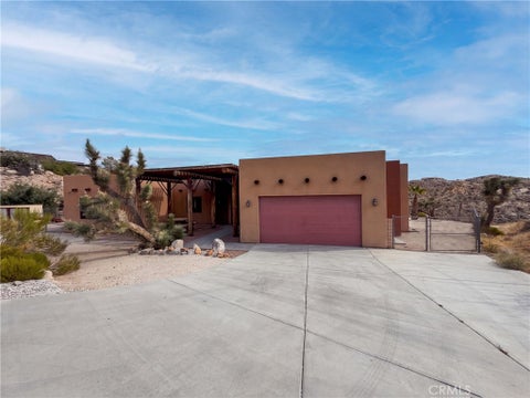 Photo of 5935 Buena Suerte RD, Yucca Valley, CA 92284 (MLS # IV26188950)