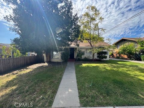 Photo of 1469 ARMADALE AVE Avenue, Los Angeles, CA 90042 (MLS # SB26076292)