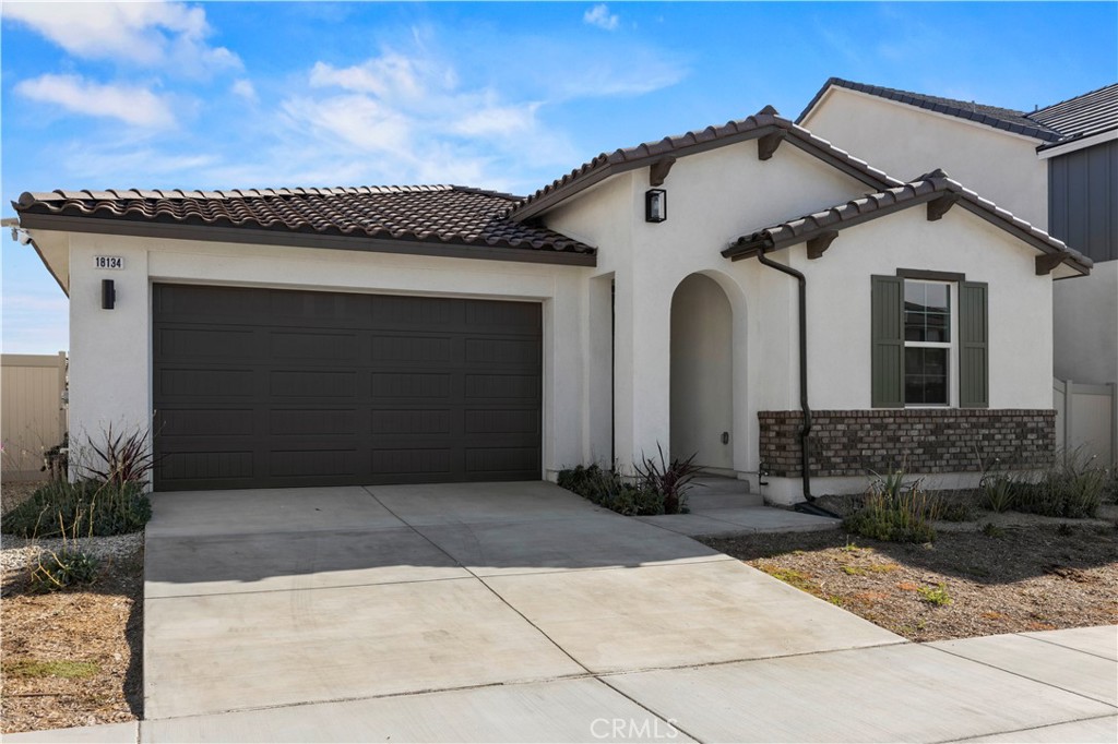 Upgrades Galore in this single story new-build (built in 2024) Luna Floorplan turnkey home! Step into luxury, comfort, and convenience in this impeccable home—possibly the most upgraded in the community! With paid-in-full solar and a whole-home smart tech system, it’s truly move-in ready—no projects, no waiting, just sit back and enjoy. Inside, you’ll find a light-filled open floor plan centered around a chef’s dream kitchen, complete with stainless steel appliances, gas oven/stove top, custom cabinetry, quartz countertops, stunning designer backsplash, and an oversized center island with upgraded quartz. Every detail has been thoughtfully selected, from the stylish black plantation shutters to the sleek black, wood, and stainless steel finishes throughout. Boasting three full bathrooms (a rarity in this community)—the primary suite is your private retreat, featuring a spa-like en suite with barn doors, a large walk-in closet, dual sinks, and luxurious finishes. The front and backyard are a blank canvas, ready for you to create your personal outdoor oasis with an already built deck off the living room featuring a high ceiling. Located in a sought-after community, you’ll enjoy resort-style amenities including pools, spas, a clubhouse, BBQ areas, playgrounds, and more. A perfect blend of modern elegance and everyday functionality—soon-to-be walking distance to a school and now park, this home is ready for you to make it yours. Schedule an appointment today!