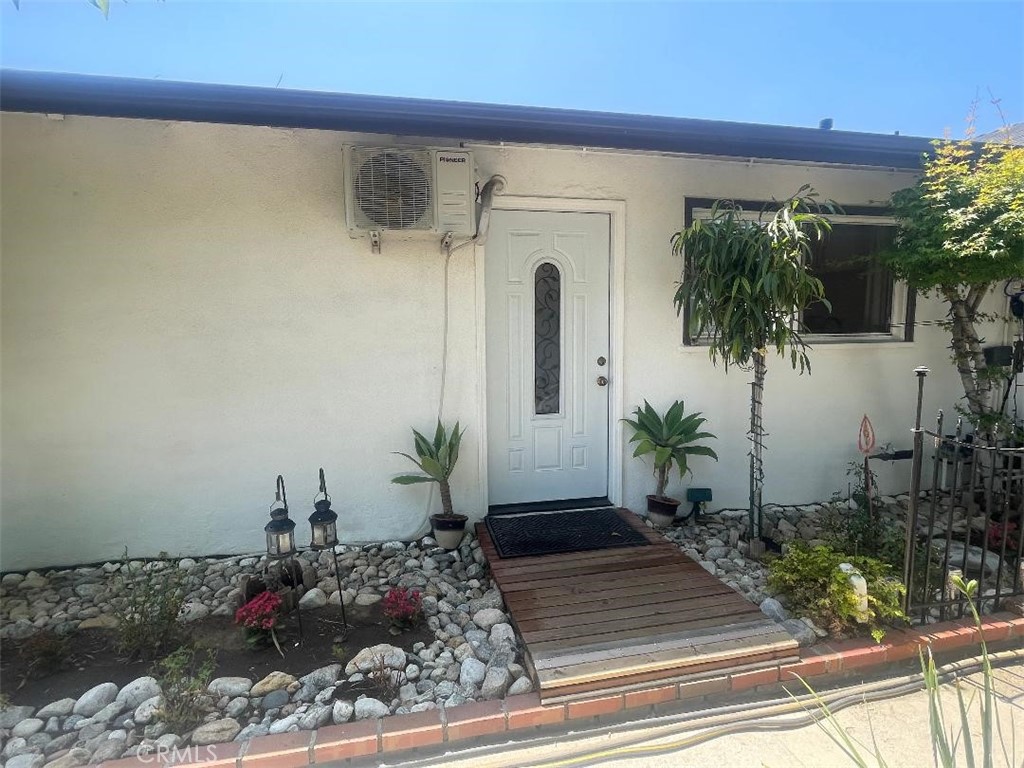 Private furnished one bedroom one bath living space with internet and all utilities included!. Welcome home to this newly painted attached room with own separate entrance. This home is 1 bed with closet, 1 bath, living room, kitchenette and plenty of storage space, light and bright, all with finishes throughout and an open floor plan. The bathroom features a glass shower stall. This home also offers hardwood like laminate flooring, double pane windows and a separate wall-mounted remote controlled heat and air conditioning unit. (Good for one Person)