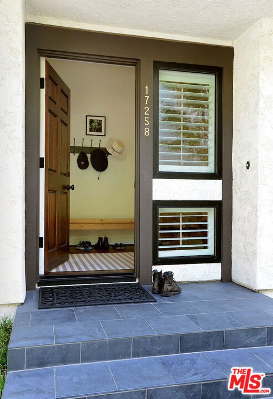 Welcome to this light-filled & private END UNIT remodeled townhouse that truly feels like a single family residence. Perfectly laid-out 2725 sqft. + high ceilings allows every room to be luxuriously spacious. A formal entry greets you and invites you into the living room w/ fireplace that spills out to a slate-tiled patio perfect for outdoor enjoyment. The formal dining room is at the center of the first level and leads you into the gourmet eat-in kitchen/family room complete with custom cabinetry, top-of-the-line SS appliances, Calcutta gold marble counters & Heath ceramic tiles.....a truly great gathering space. Upstairs are three well-positioned bedrooms. The 2nd & 3rd bedrooms share a beautiful hallway bath and the primary suite is simply grand in size and boasts a walk-in closet, wraparound balcony and a spa-like bathroom with separate shower & tub and dual sinks. Newer windows & sliders, wide-plank oak hardwood flooring thru-out, freshly painted, extra-large deep 2-car garage with direct entrance and A+ HOA amenities....pool/spa/gym/sauna....complete this residence. ***Per owners, the property did not suffer damage and the interior was remediated including new insulation and ducts in the attic.