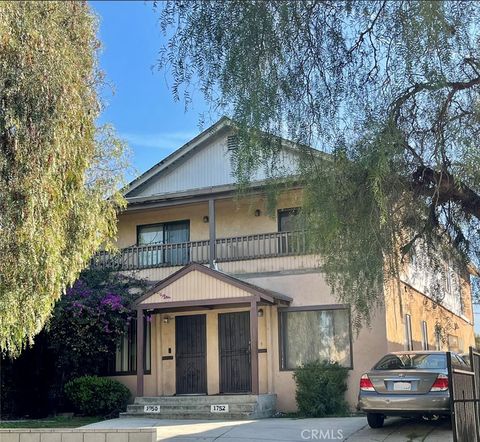 Photo of 1750 S Mansfield Avenue S, Los Angeles, CA 90019 (MLS # IV25272337)