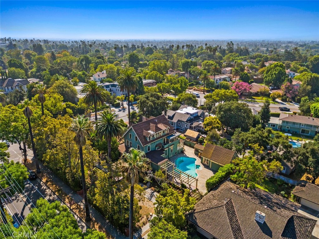 Step into South Pasadena’s storied past with the iconic Bissell House, an exquisite Queen Anne Victorian estate built in 1887 along the prestigious Millionaire’s Row. This architectural gem spans 5,535 square feet across three stately levels, offering 7 bedrooms and 8 bathrooms. Once home to Anna Bissell McCay, daughter of the Bissell vacuum family, and her husband, architect William S. McCay, this Victorian landmark has welcomed generations of Pasadena’s early visionaries and cultural figures through its doors. Two grand porte-cocheres frame the entrance, inviting you into a world of ornate detailing and historic charm. Inside, discover formal living and dining rooms, a richly paneled library, and a spacious utility basement. The estate also features a separate pool house, a two-car garage, and dual kitchens main and prep with Viking range and Sub-Zero refrigerator. All perfectly positioned on a generous half-acre corner lot. Original Victorian artistry with standout features including Tiffany stained-glass windows, Edwardian clawfoot bathtubs, and a rare Sedgwick elevator, an extraordinary nod to the home’s legacy. Once a celebrated bed and breakfast and wedding venue, the Bissell House offers a rare opportunity for restoration or reinvention. Whether you envision a private residence, boutique hospitality venture, or curated event space, this estate is ready for its next chapter in the hands of a visionary owner.