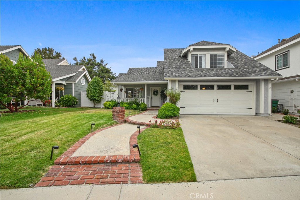 This is a BEAUTIFUL turnkey home. 3 Bedrooms, 2.5 baths. Open floor plan, a lot of upgrades. New windows, newer updated appliances. Home has a formal dining room with cathedral ceilings. Was remodeled few years ago with all trending design. Newer kitchen (eat-in kitchen) and bar top area, quartz countertops, subway tile backsplash, fireplace in Family room off kitchen area leading to outside patio. Upstairs master bedroom has a balcony and an amazing panoramic view of the mountains, and oversized walk in closet. Master Bath has double vanities, walk-in shower. All 3 bedrooms upstairs and 2 full bathrooms. Downstairs has 1/2 bath. 2 car attached direct access garage additionally there is an electric vehicle charger. This home has lake access and is less than 2 miles away from the main entrance to Mission Viejo lake. Beautiful Views! Trabuco High School is close by, local shops, restaurants. This is a beauty!
